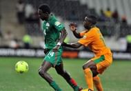 Burkina Faso's Wilfried Balima (L) vies with Zambia's Emmanuel Mbola (R) at Mbombela stadium on January 29, 2013